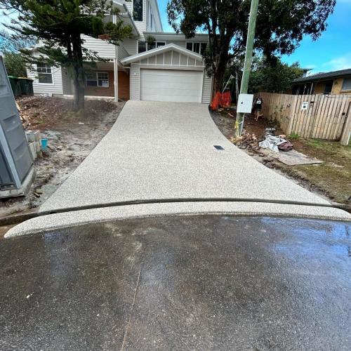 exposed aggregate concrete driveway completed